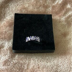 Size 6 Bomb Party Ring. Light Tanzanite Cubic Zirconia Rhodium Plated.